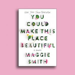 A picture of the book cover for "You Could Make This Place Beautiful" by Maggie Smith over a pink backdrop. The book cover features the title neatly cut into paper with the flaps opening to expose flowers and leaves poking through the letters.