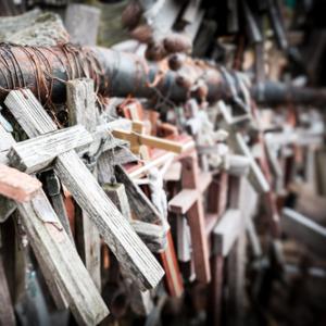 Crosses gathered for mourning. Photo courtesy Konstantin Yolshin/shutterstock.co