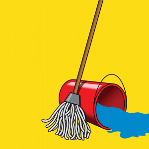 A mop stands next to a red bucket of water that is tipped over and spilling water.